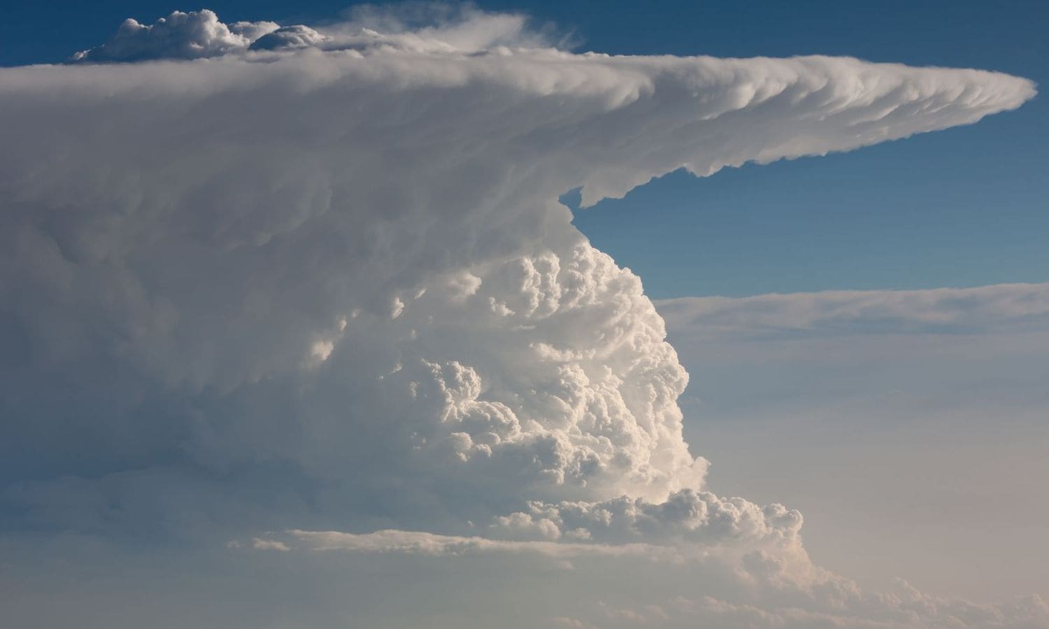 Storm Exit Maintains Clouds and Coolness