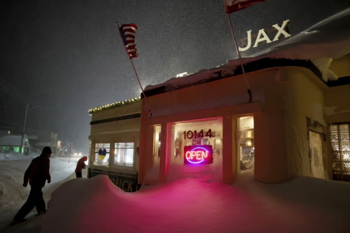 Workers Brave 10-Foot Snow Tunnel