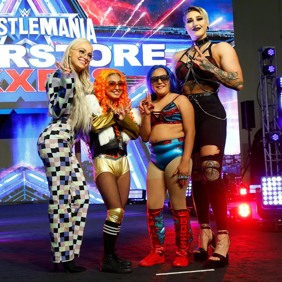 Rhea Ripley Meets Mr Iguana Backstage