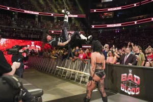 Rhea Ripley Dominates in Intense Cage Match Showdown with Mercedes Martinez