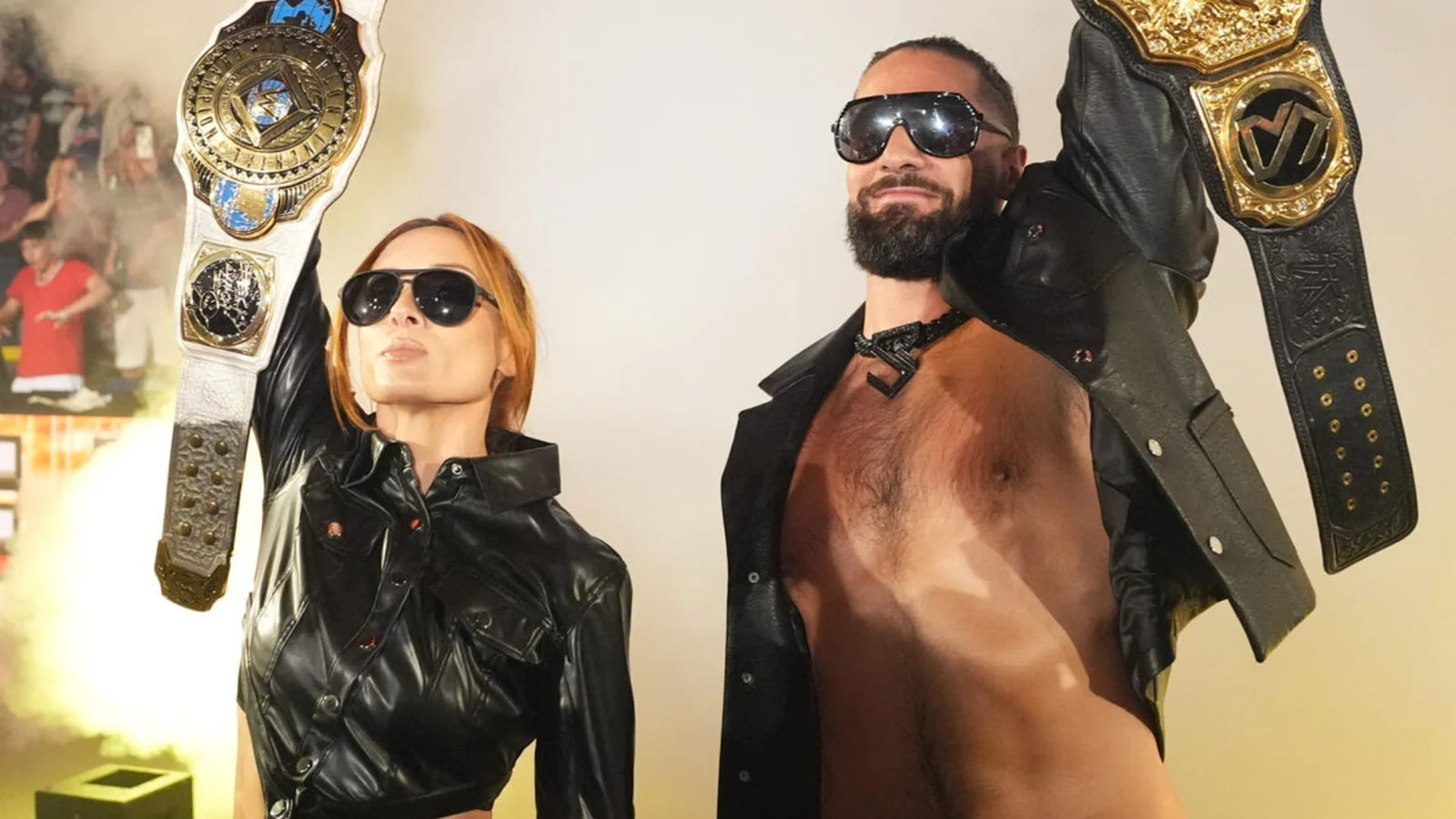 Seth Rollins consoles Becky Lynch